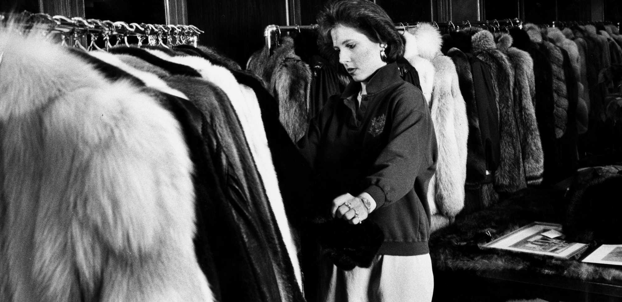 An employee at Kakas Furs adjusted the coats on the racks on Jan. 3, 1990. Chuck Stuart was general manager at the posh Newbury Street store, which sold lavish fur coats to the jet set. 