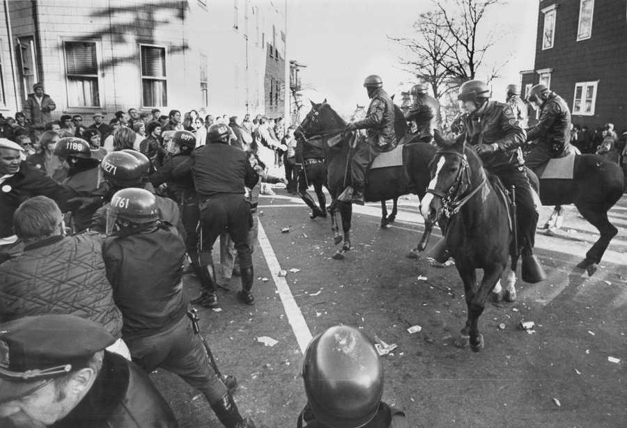 Police responded to a melee over busing in Boston public schools on Dec. 11, 1974. (Ted Dully/Globe Staff)