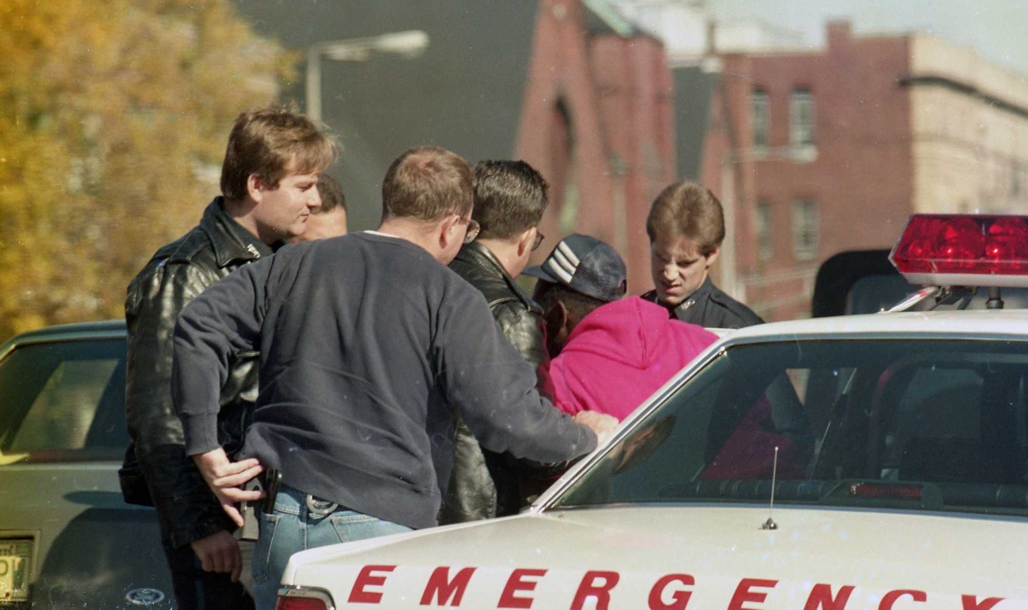 Boston police detained a man in a patrol car in Mission Hill on Oct. 24, 1989. 