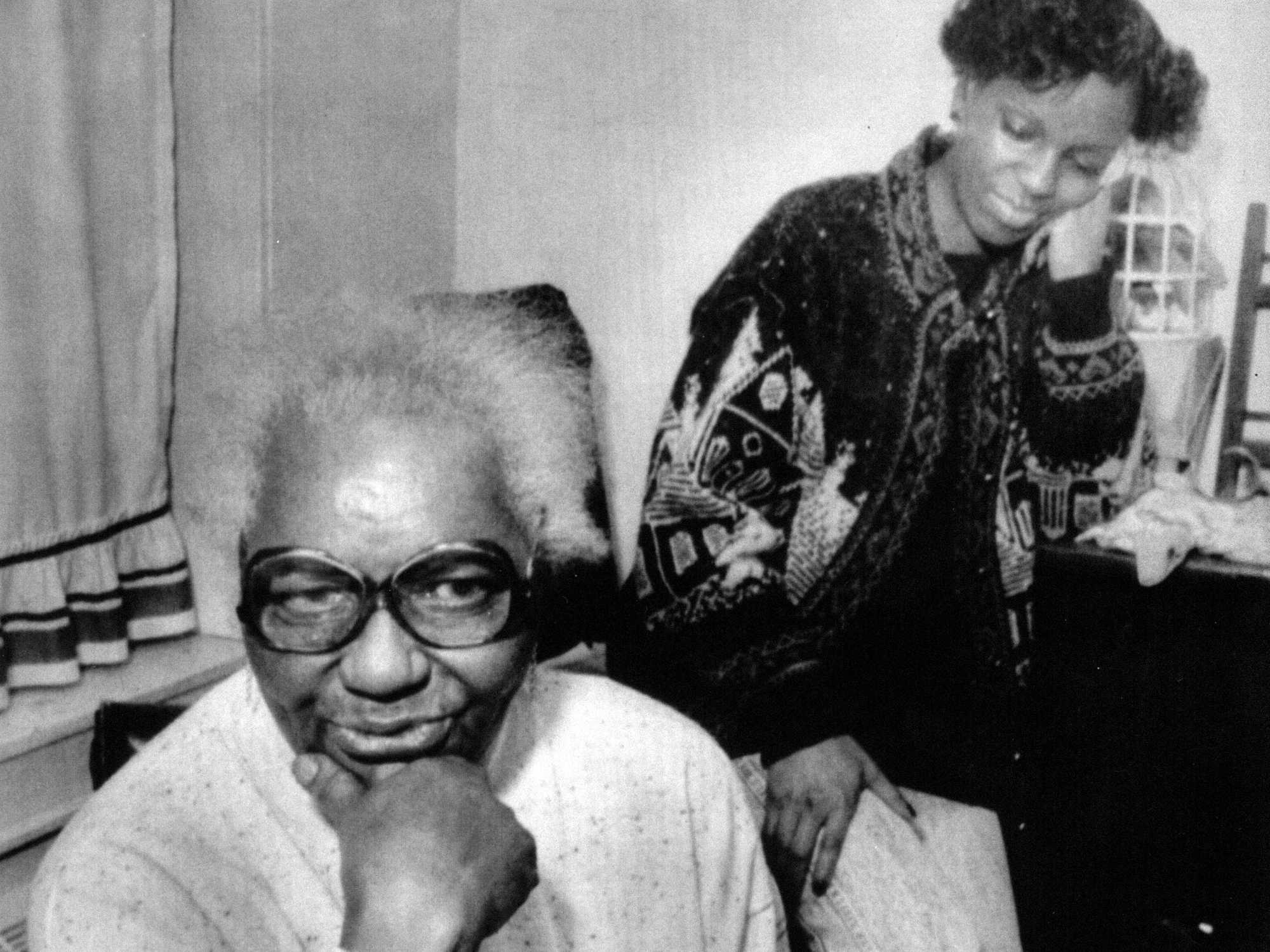 Pauline Bennett, mother of William "Willie" Bennett, and her daughter Tarita in December 1989. The Bennetts insisted their son and brother was innocent when he was publicly cast as the main suspect in the Stuart shooting. 