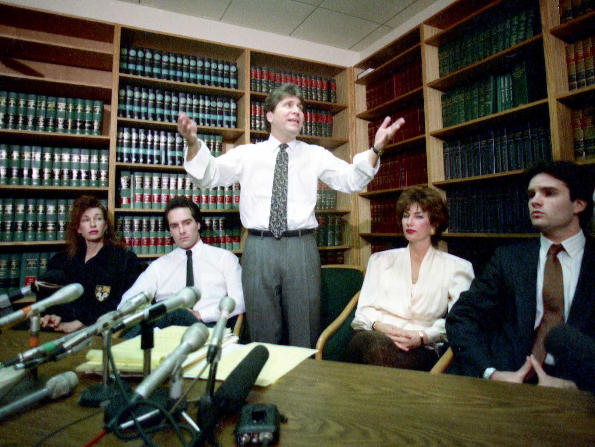 Attorney Richard Clayman spoke at a press conference called by the Stuart family on Jan. 11, 1990. From left, Shelley Yandoli, Michael Stuart, Neysa Porter and Mark Stuart. 