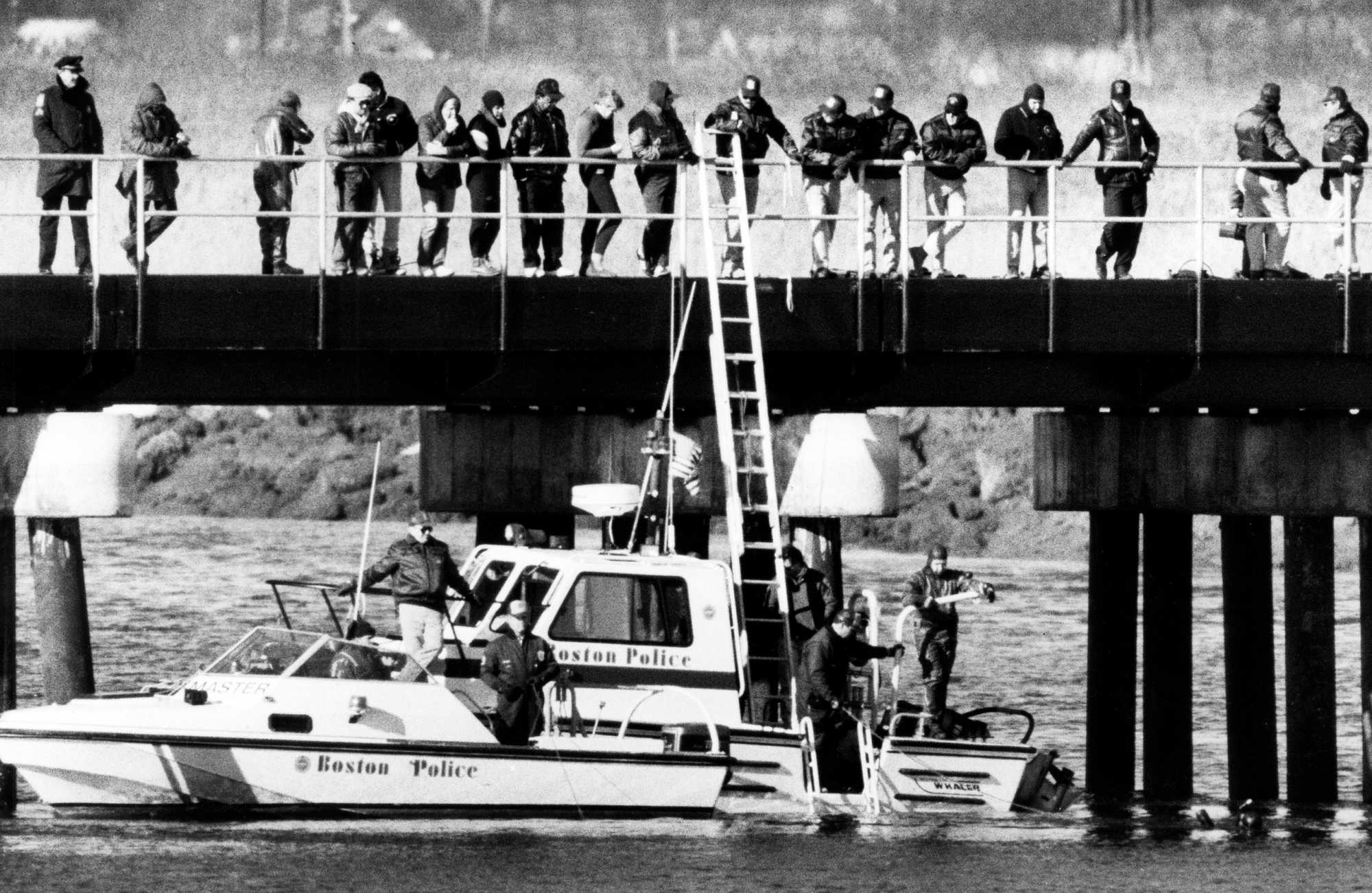 Boston police divers searching the Pines River for the gun used in the murder of Carol Stuart on Jan. 5, 1990. 