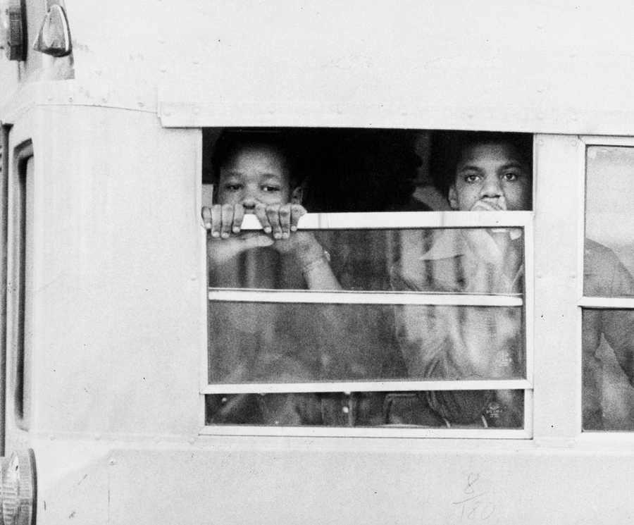 Two students waited on a school bus before being admitted to South Boston High School on Jan. 8, 1975. (Jack O'Connell/Globe Staff) 