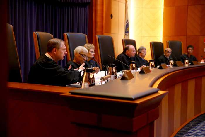 The Supreme Judicial Court justices in 2016. From left: Justice David A. Lowy, Justice Geraldine S. Hines, Justice Margot Botsford, Chief Justice Ralph D. Gants, Justice Barbara A.Lenk, Justice Frank M.Gaziano,and Justice Kimberly S. Budd. At the time of the Brown ruling in 2017, Justice Elspeth Cypher had replaced Botsford. 