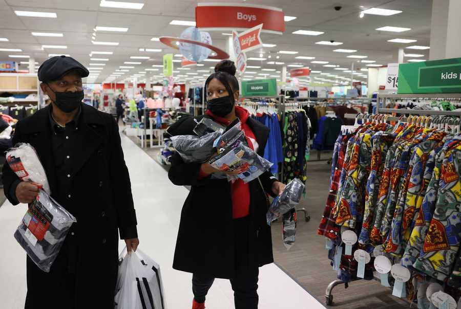 FOR SPOTLIGHT PROJECT ONLY - Braintree, MA--12/10/2021--  Leah Jackson took her dad, Joseph Jabir Pope, (L) to Target and helped him shop for socks, underwear, and other necessities a day after he was released from prison after 37 years of incarceration. (Jessica Rinaldi/Globe Staff) 

