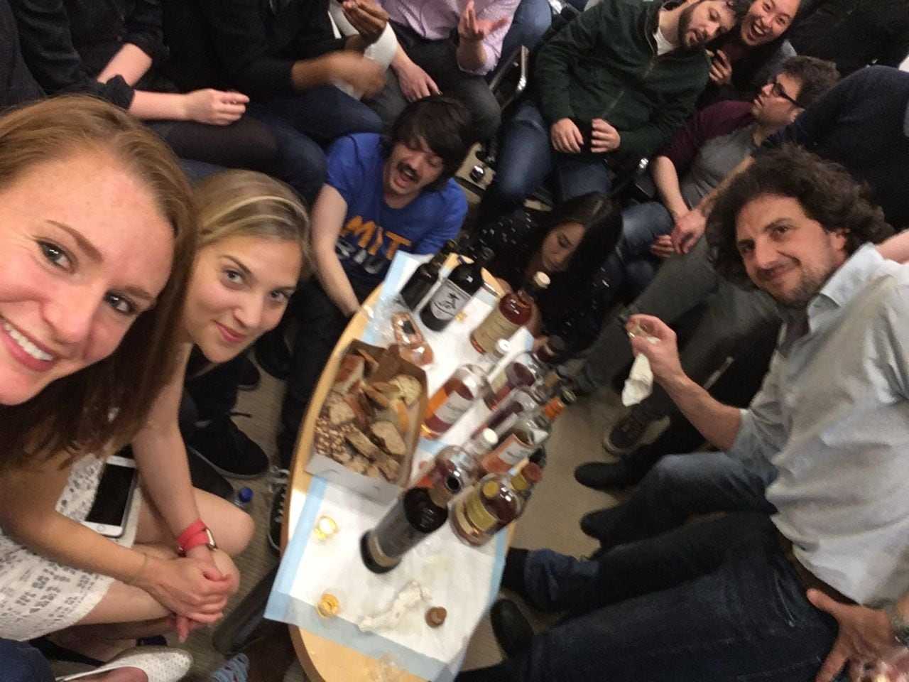 Kristin Knouse (far left) and David Sabatini, (far right) at a whiskey tasting in May 2018. 