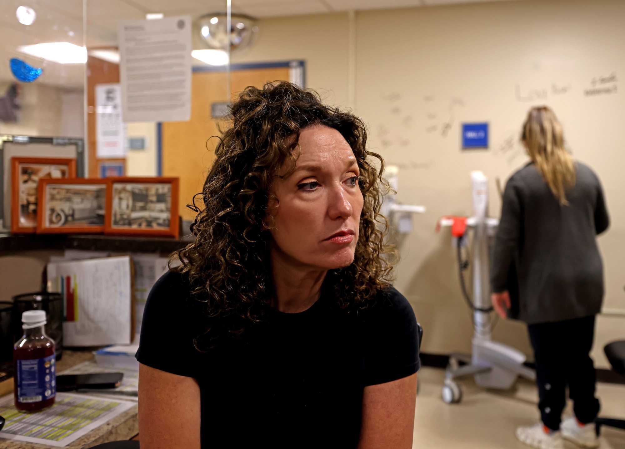 Emergency department nurse Kelly Miller sat at the nurses’ station on the last full day of operations at Nashoba Valley Medical Center in Ayer on Aug. 30. Nashoba was one of two hospitals, with Carney the other, that Steward closed in Massachusetts recently.