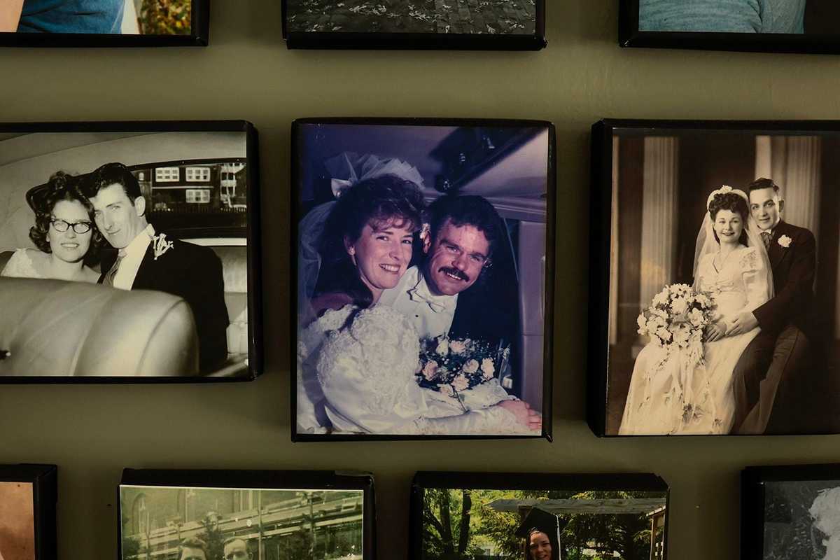 Mike and Joan Shea’s wedding photo, center, is displayed at their home.