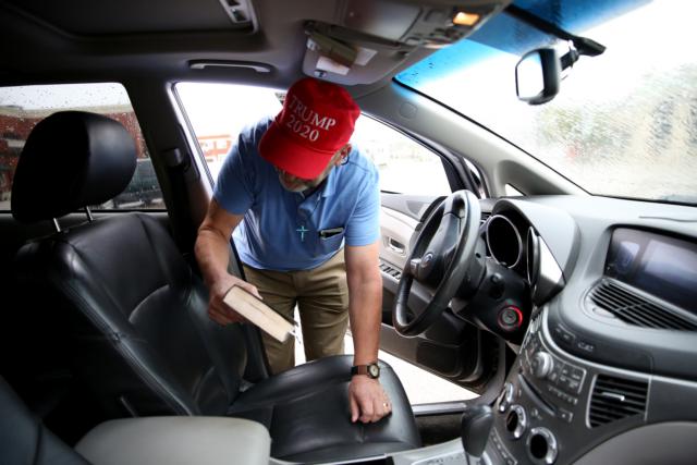 Chris Martinson placed his bible in his car as he left Familiar Grounds Coffee Shop and made his way to Victory Church for Sunday service.