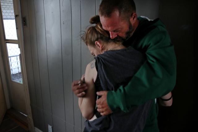 Shawn Hanshaw embraced his girlfriend at their home in Portsmouth, Ohio.