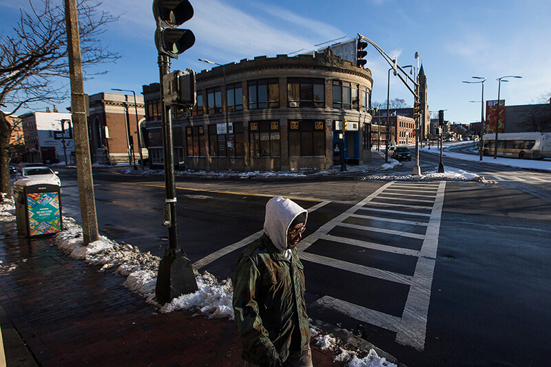 A man makes his way through Dudley Square in Boston in early January.