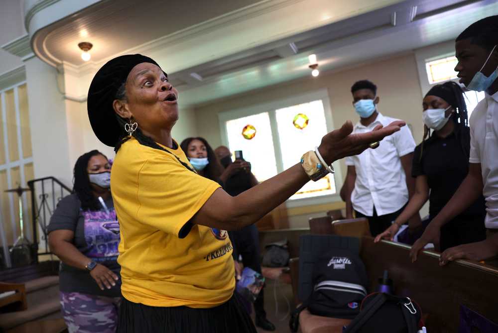 Faya Toure taught a song to students from the Ellwood Christian Academy during a workshop at the historical Tabernacle Baptist Church, commemorating Colia Lafayette Clark Freedom Day in Selma, Ala.