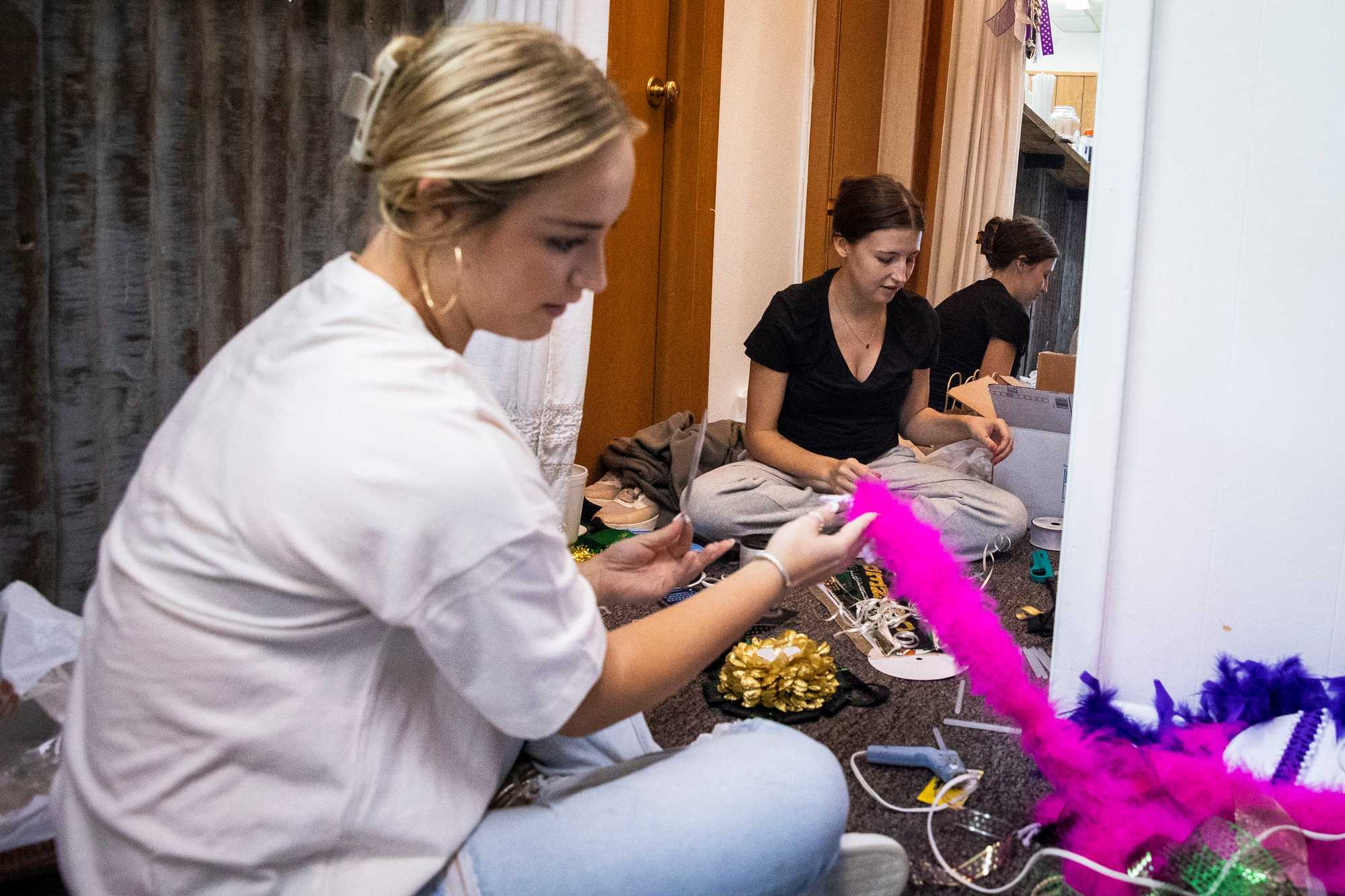 Abby Burkham (left) and Rylee Allemand made Texas mums for homecoming.