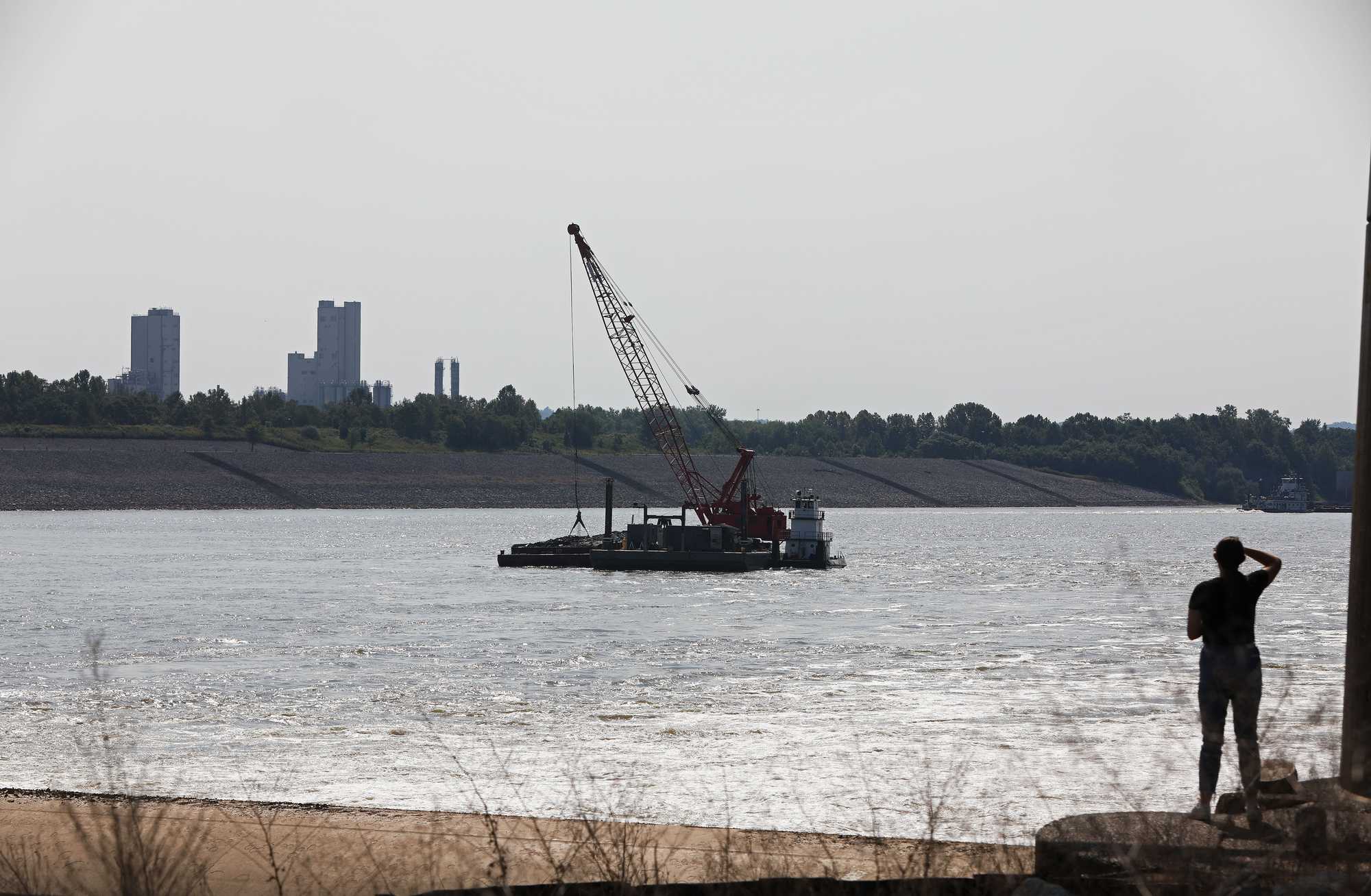 After the fog lifted on a cold morning, reporter Emma Platoff watched dredging on the Ohio River.