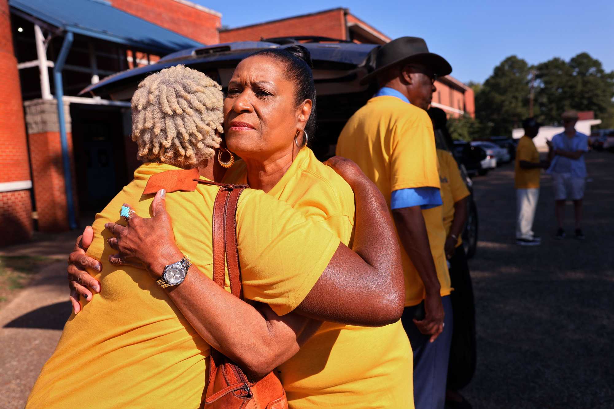  Betty Boynton ( left) embraced the Rev. Evelyn Manns before beginning a march commemorating Colia Lafayette Clark Freedom Day.