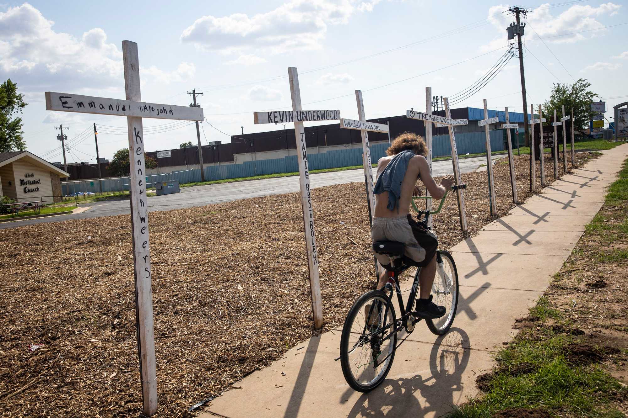 Each of the 7-foot crosses outside Clark Memorial United Methodist Church represents a death row prisoner. When one of the prisoners is executed, the cross bearing his name will be covered with red paint.
