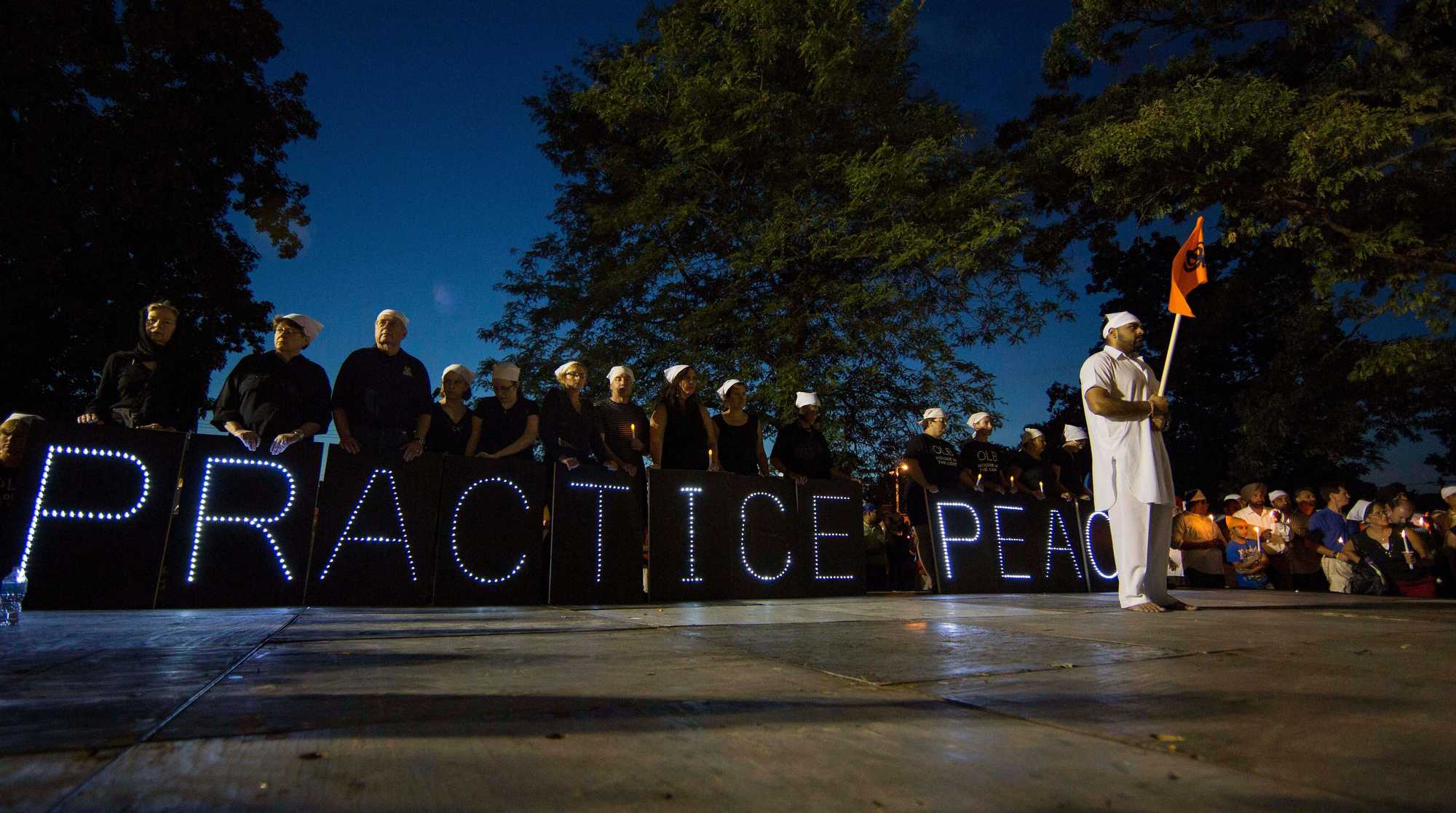 A candle light vigil was held Aug. 7, 2012, in Oak Creek, Wisc., for the victims of a mass shooting at the Sikh Temple. 