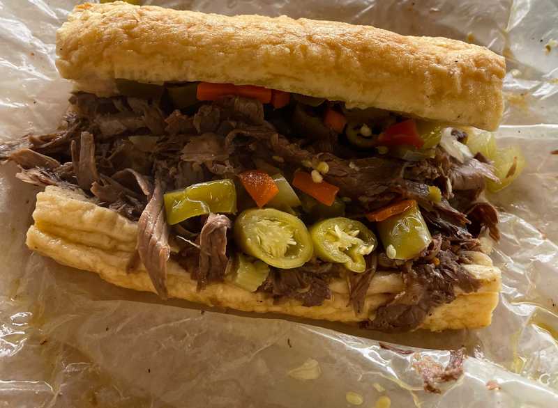 An Italian beef, hot and dipped, from Johnnie's Beef in Elmwood Park, Ill. It cost $7.14 for the sandwich, no sides.