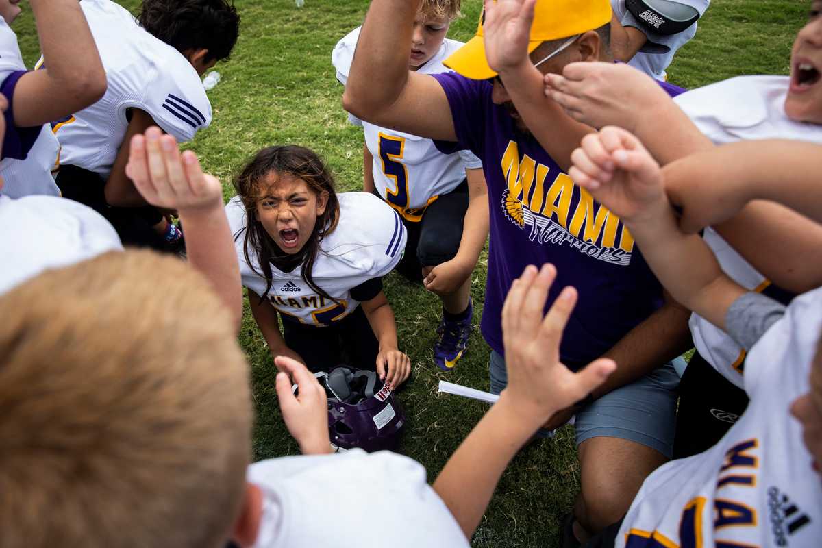 Callie John Calvert screamed her rallying cry with her teammates at her first game for Miami independent school district in Miami, Texas.