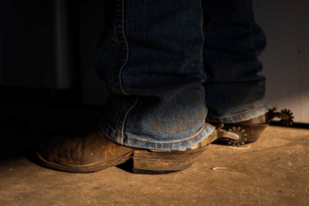 Booze wore a pair of custom boot spurs while working on the ranch.