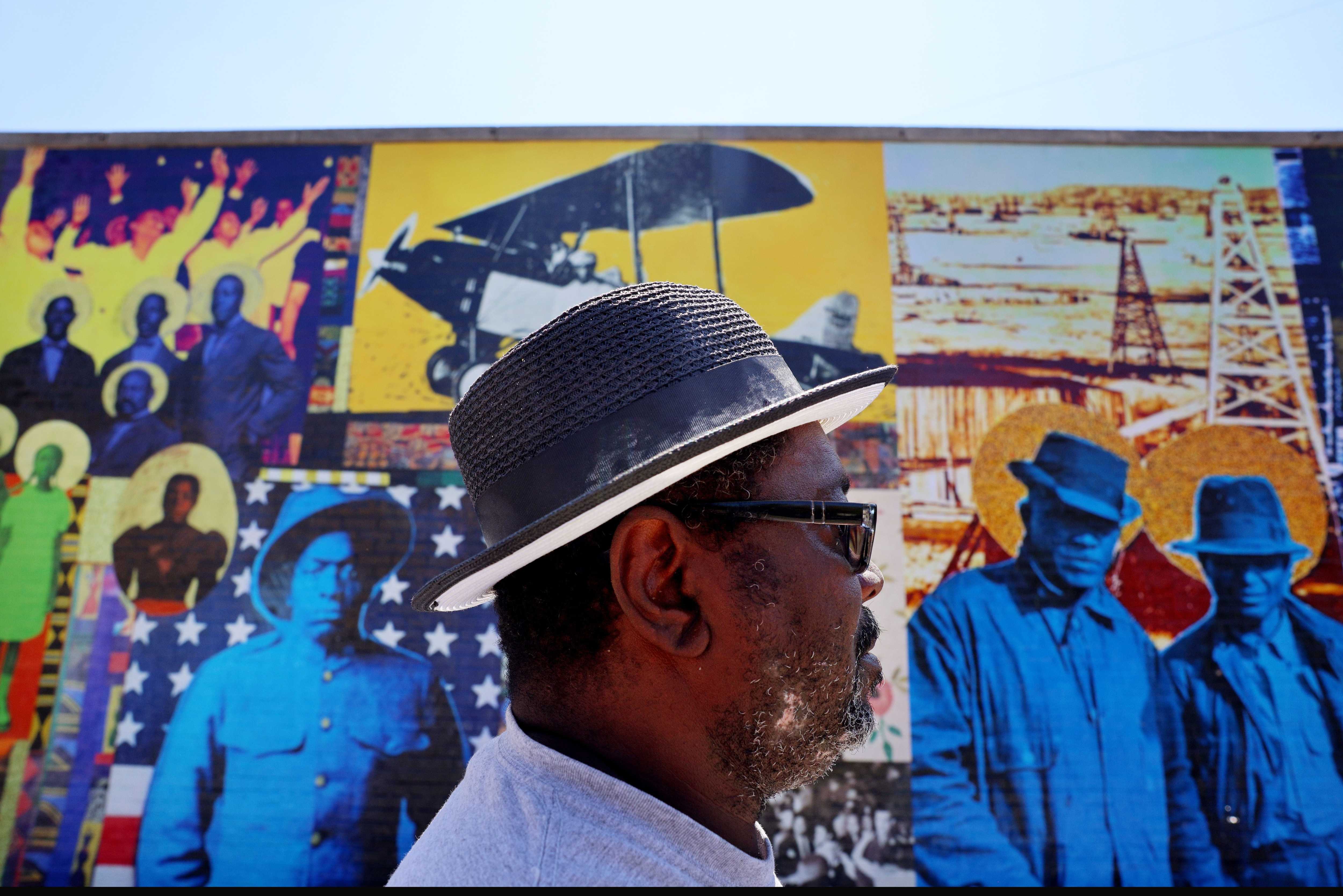 Terry Baccus was born in Tulsa in 1963. “My experience is that it wasn’t Black Wall Street to us, it was just Greenwood,” said Baccus, while standing outside a Greenwood restaurant.