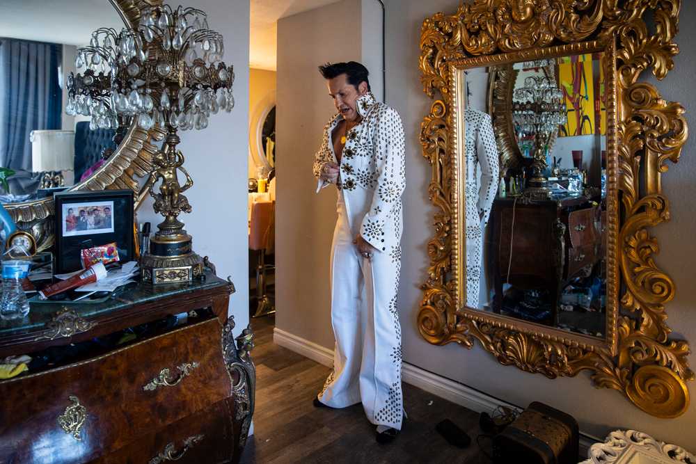 Jesse Grice, an Elvis impersonator of over 30 years, zipped up his suit.