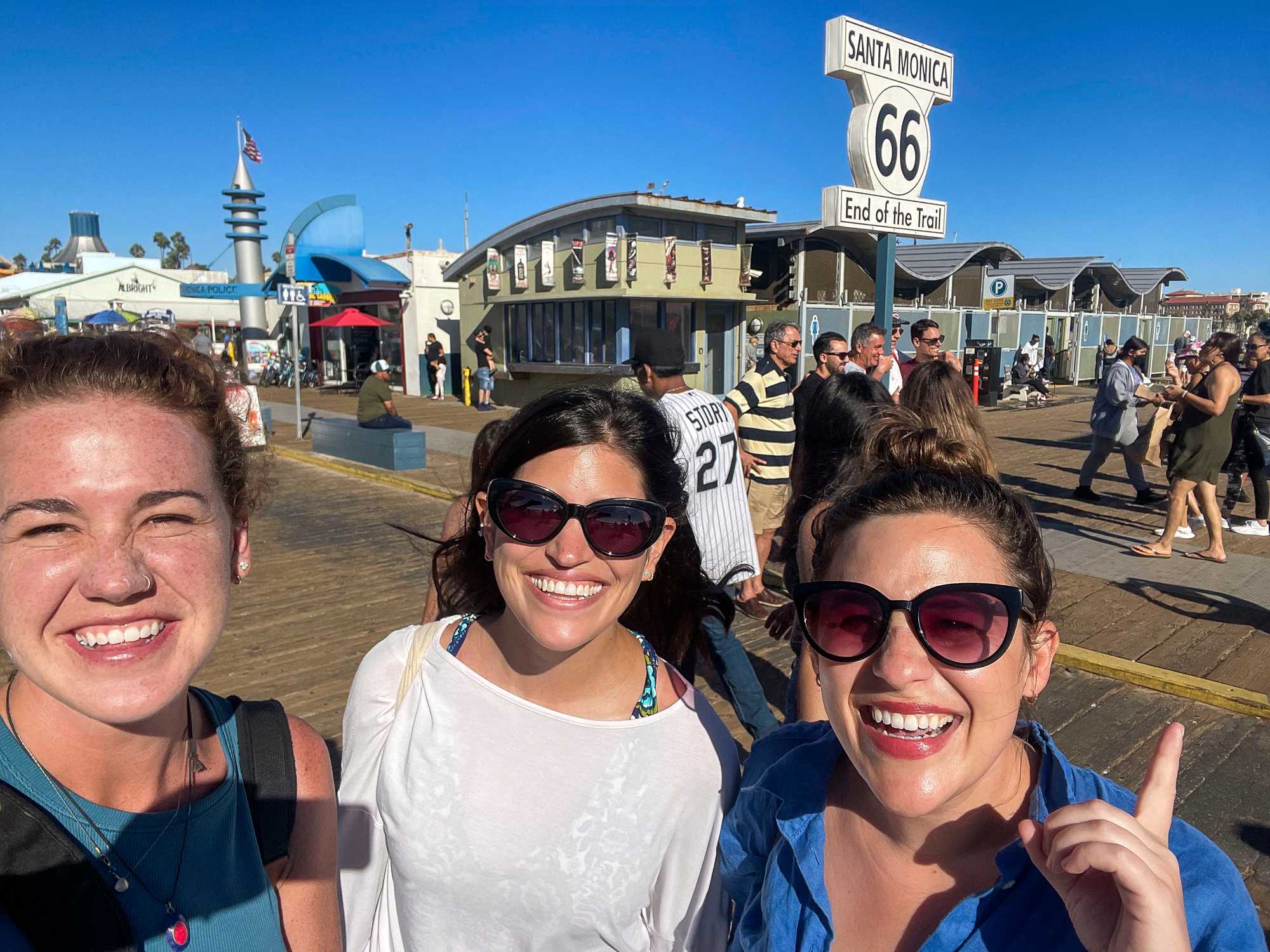 Globe staffers Erin Clark, Lissandra Villa, and Annalisa Quinn took a selfie to mark the end of their journey at the end of Route 66 in Santa Monica, Calif.