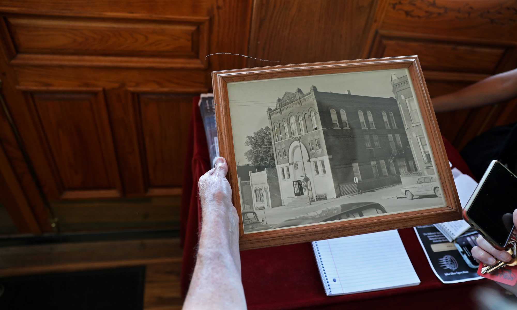 “Many changes have taken place over the years to the front of the building. The building next door was a business at one time, but was later used by the opera house," said Judy Striegel, while looking at an old photo of the opera house, believed to be taken in the 1950s.