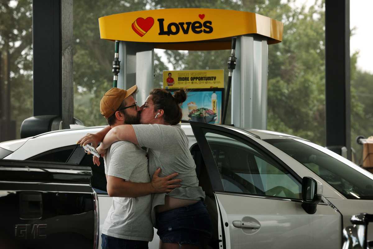 David Koehnlein shared a moment with his fiancé, Meredith Allen, at the Love’s Travel Stop in Lee, Fla., on Sept. 19. The couple were returning home to Orlando after visiting family in Auburn, Ala. 
