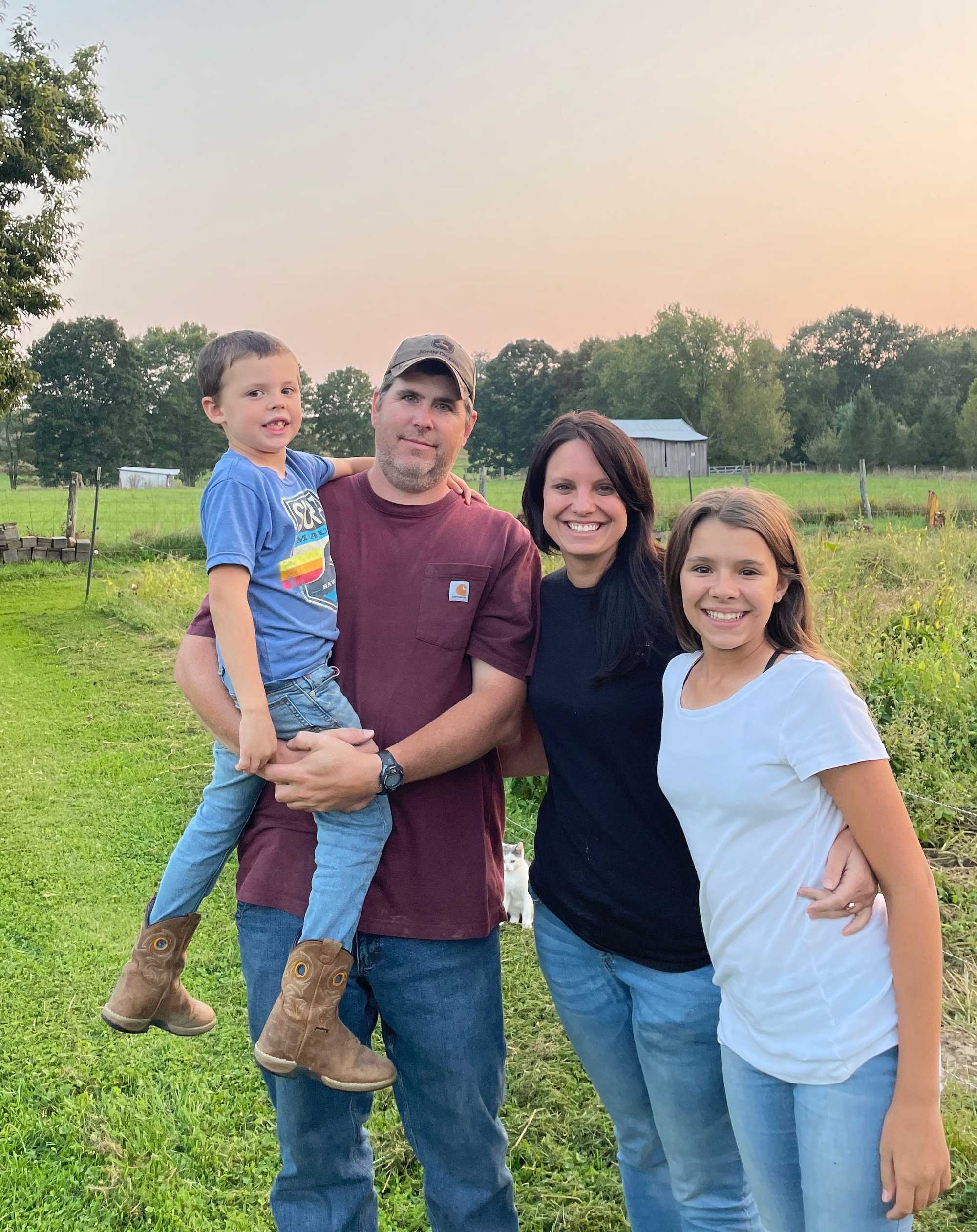 From left to right: Isiah, Josh, Melia, and Moriah Thompson in their backyard in Green Bank, W.Va., about 3 miles from the Green Bank Telescope. 