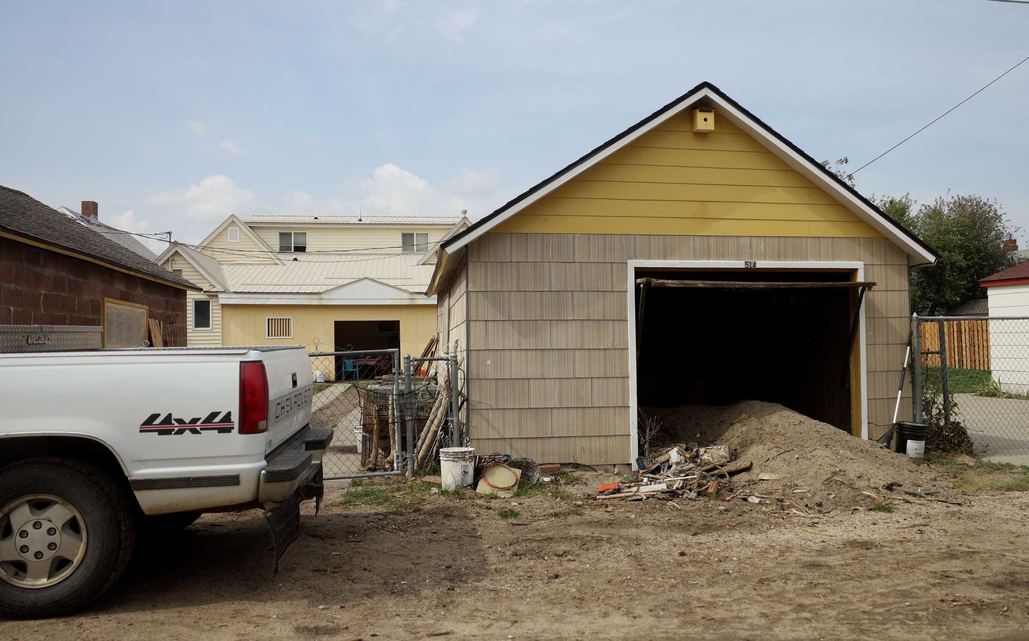 A pile of debris from the flooding was still coming out of a garage in Red Lodge in September. 