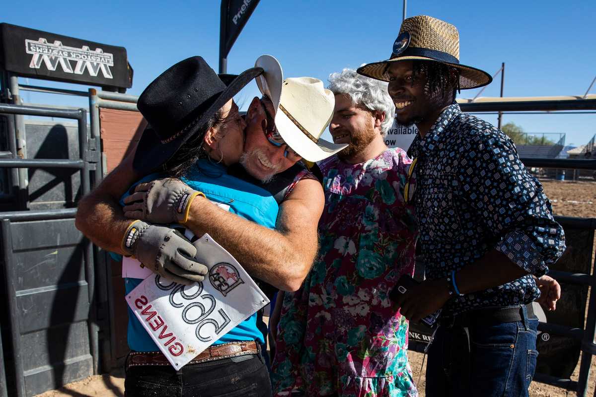 Christina Miner (left) kissed a fellow contestant after competing in the Wild Drag Race competition at the Nevada Gay Rodeo Association’s BigHorn Rodeo in September.