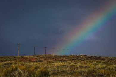  A rainbow stretched to the ground after a storm in New Mexico.