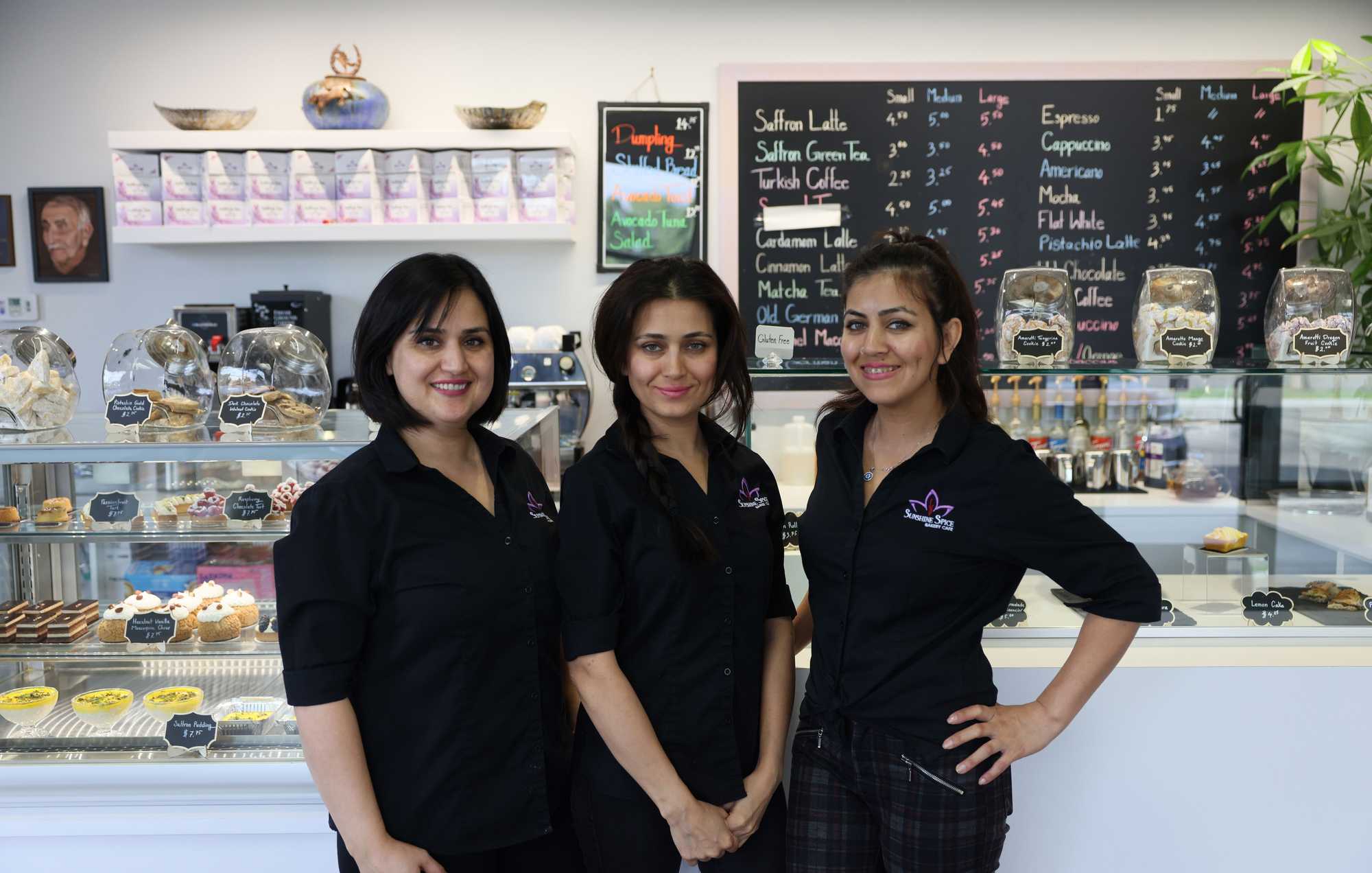  (L-R) Sisters Khatera Shams, Narges Shams and Homeyra Shams posed for a portrait inside Sunshine Spice Bakery & Cafe in Boise, Idaho. 