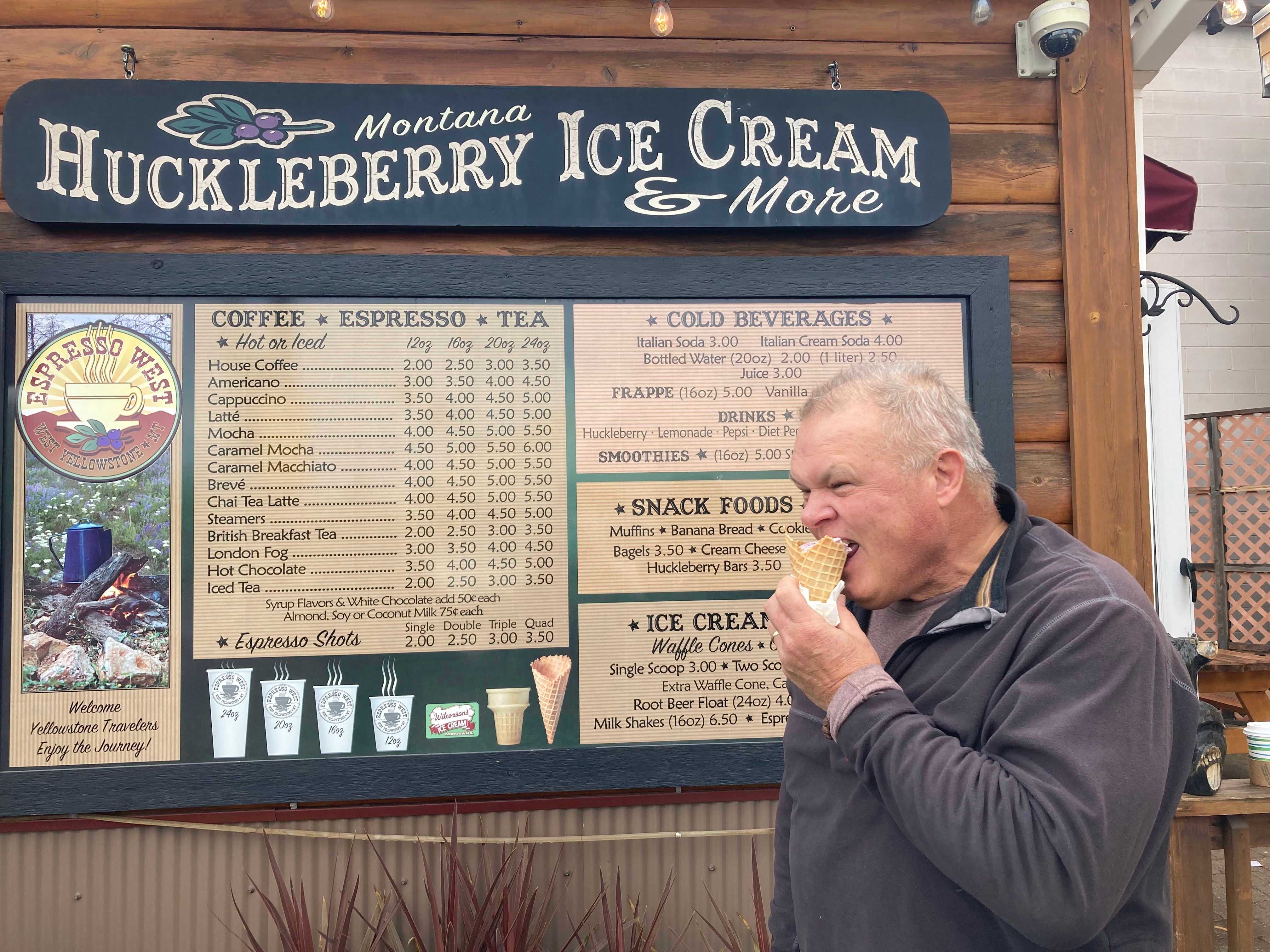 Joe Browder from North Carolina tried the huckleberry ice cream in a waffle cone at Espresso West in West Yellowstone, Mont.