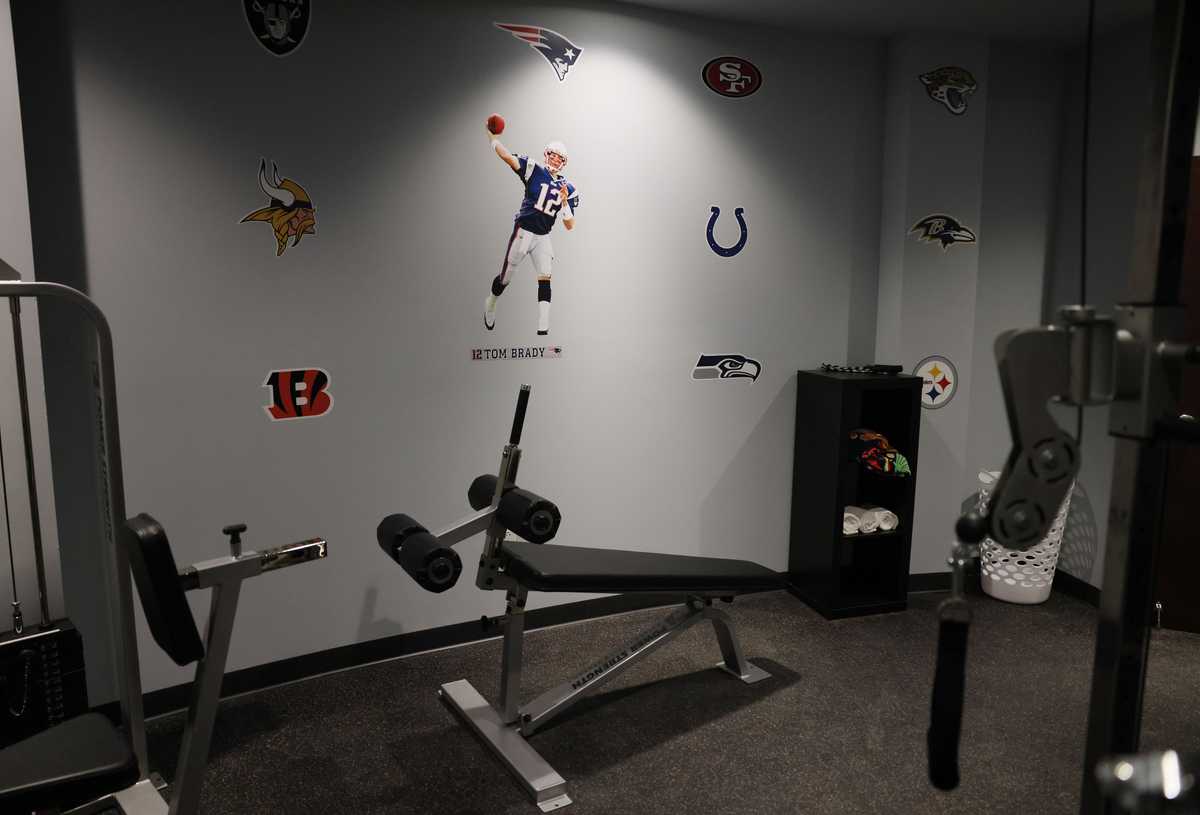 A picture of Tom Brady adorned the wall inside the fitness center of the Survival Condo.
