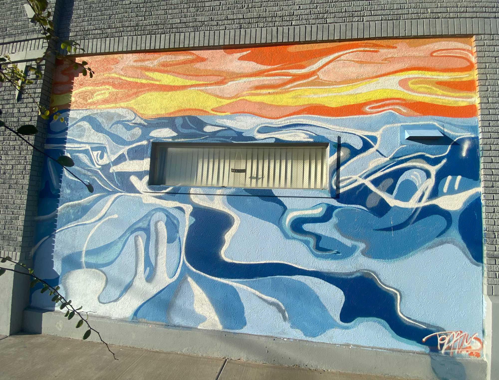 A mural painted by Tommy Lee. 
