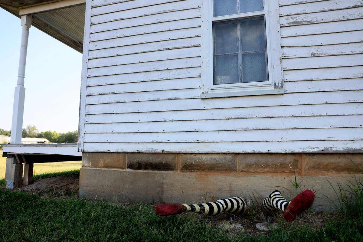 The OZ Museum has inspired new life in Wamego and that's reflected around the community. At a building once thought to be the birthplace of Walter P. Chrysler, the founder of Chrysler Corp., a pair of fake witch's legs stick out from under the foundation. 
