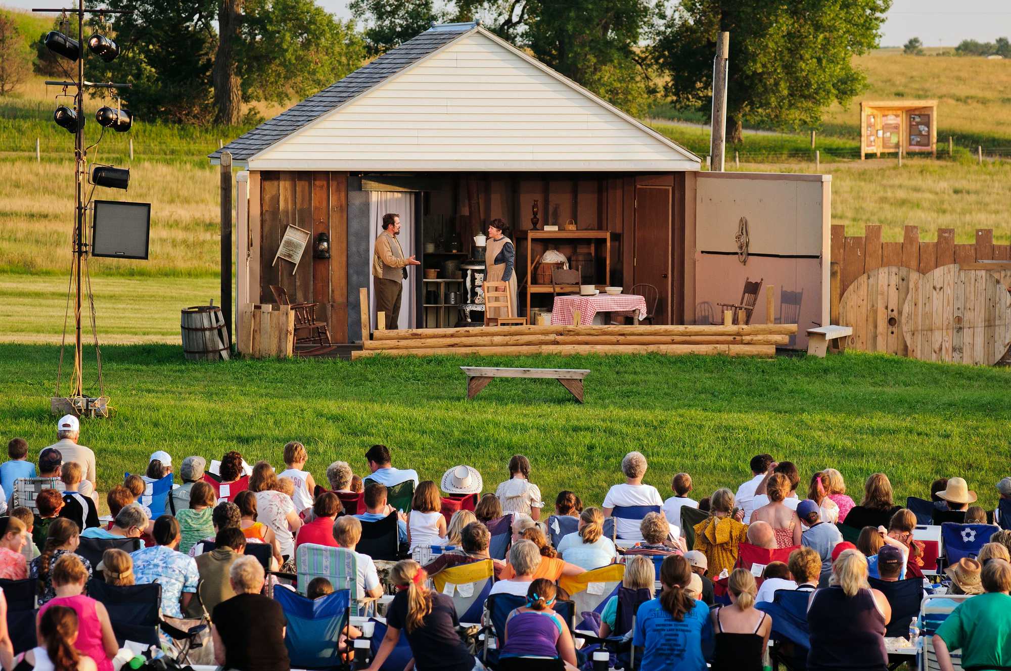 A large crowd watched actors perform in the 2011 Laura Ingalls Wilder Pageant. 