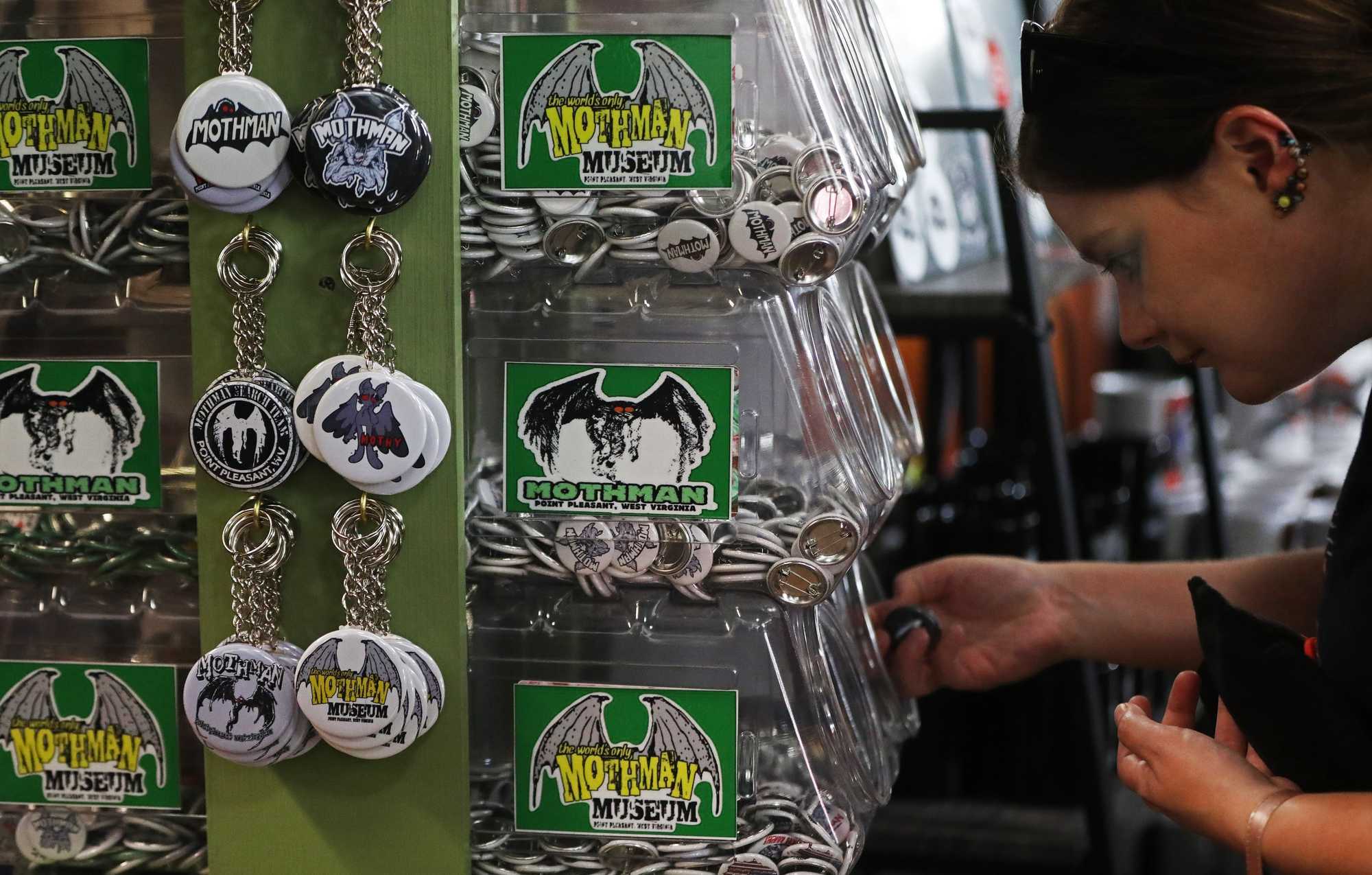 Nadine Kramer, of Bethlehem, Pa., looked for buttons in the Mothman Museum.  