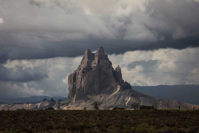 Storm clouds gathered over Shiprock.