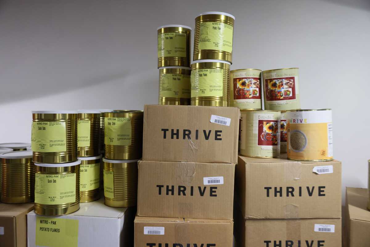 Containers of shelf-stable foods are stored inside the Survival Condo.  
