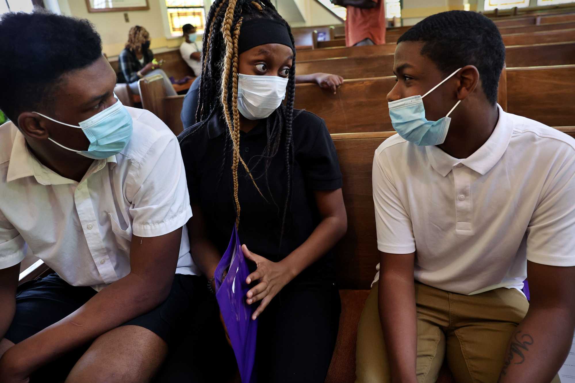 Students (left to right) Kendrick Munford, Jakiya Cowan, and Diangelo Acoff worked on a conflict skit during a workshop.