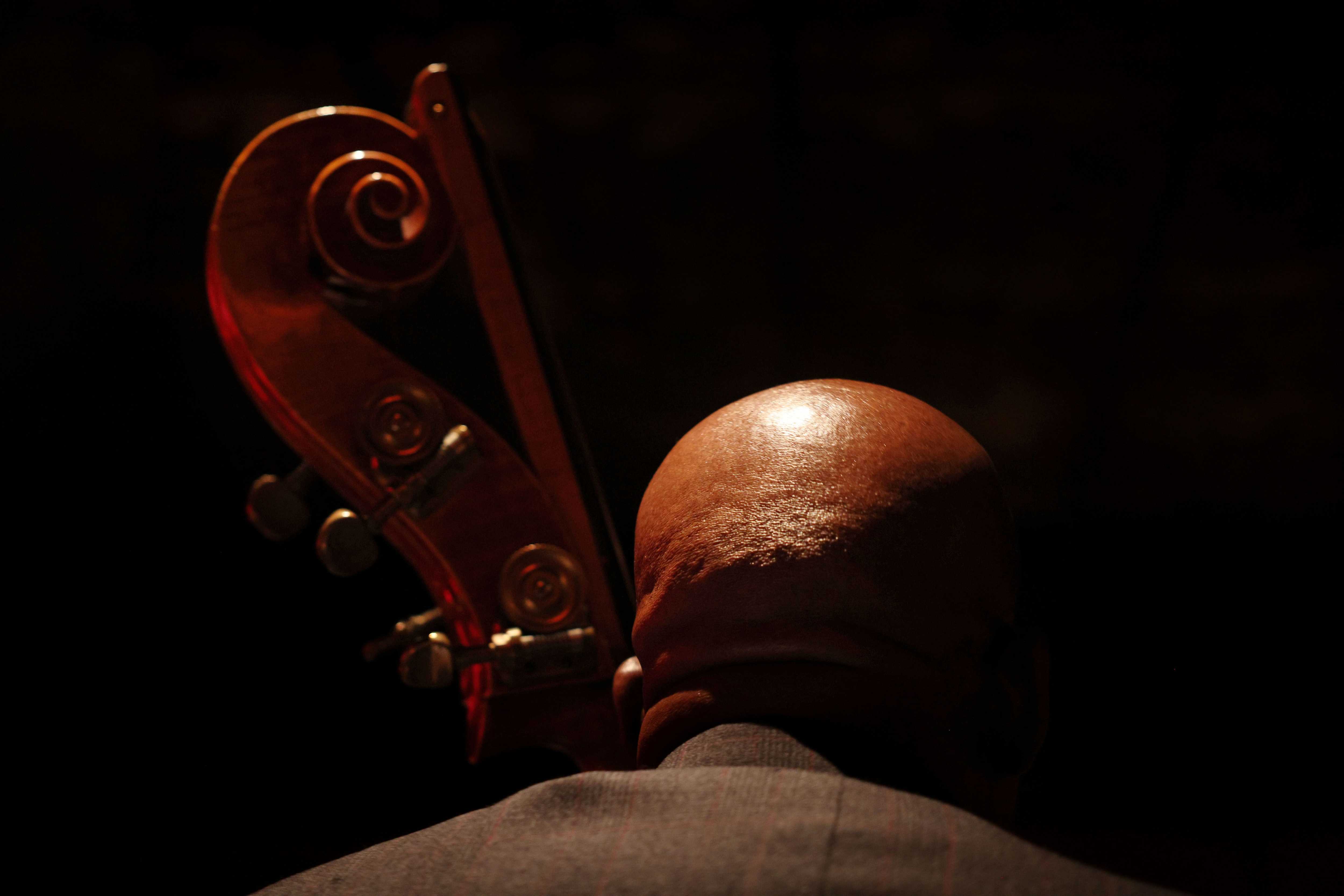 Tyrone Clark played bass with his trio at the Green Lady Lounge, where musicians perform original compositions.