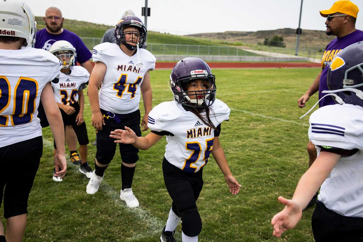 After the game, she high-fived players from the opposing team.