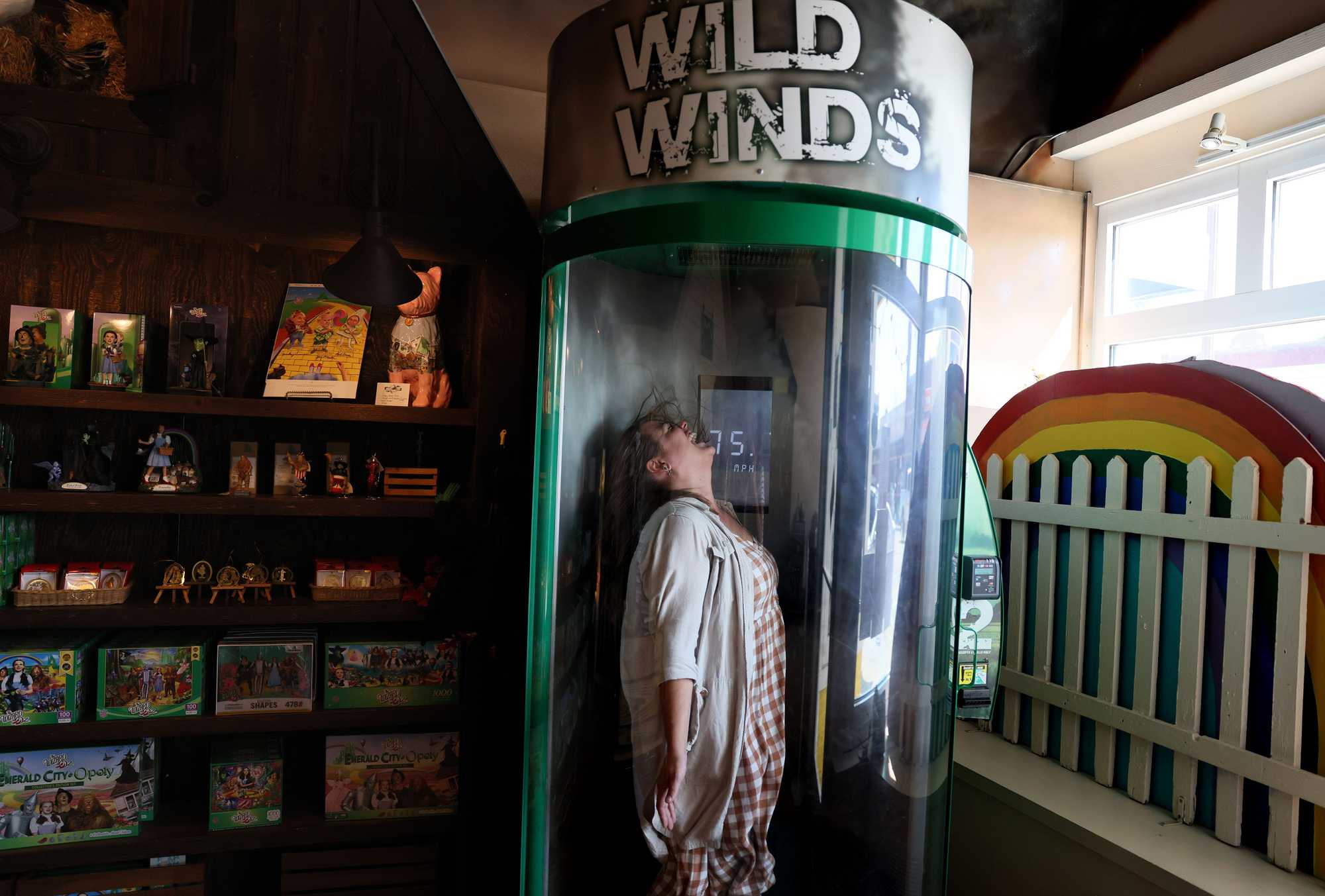 Laura Fredrickson laughed as she tested out the OZ Museum's tornado simulator.
