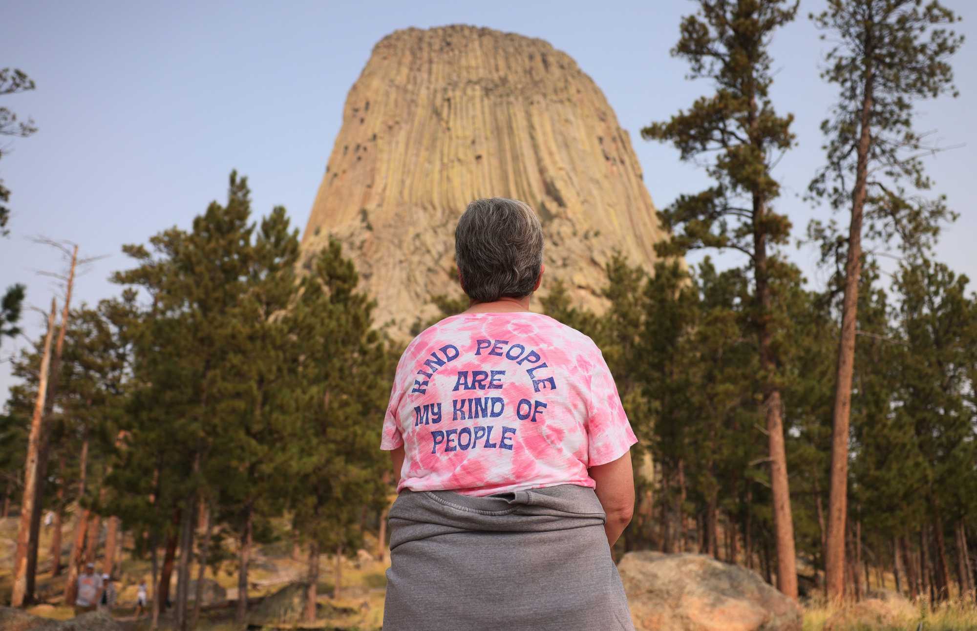 A woman paused to take in the view of Devils Tower as she hiked along the trail that surrounds it.