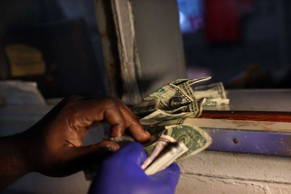  Jones Jr. took cash for an order at Jones Bar-B-Q Diner.