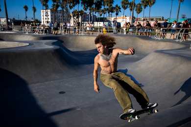 A skateboarder enjoyed the skatepark at Venice Beach in Los Angeles on Monday evening. 