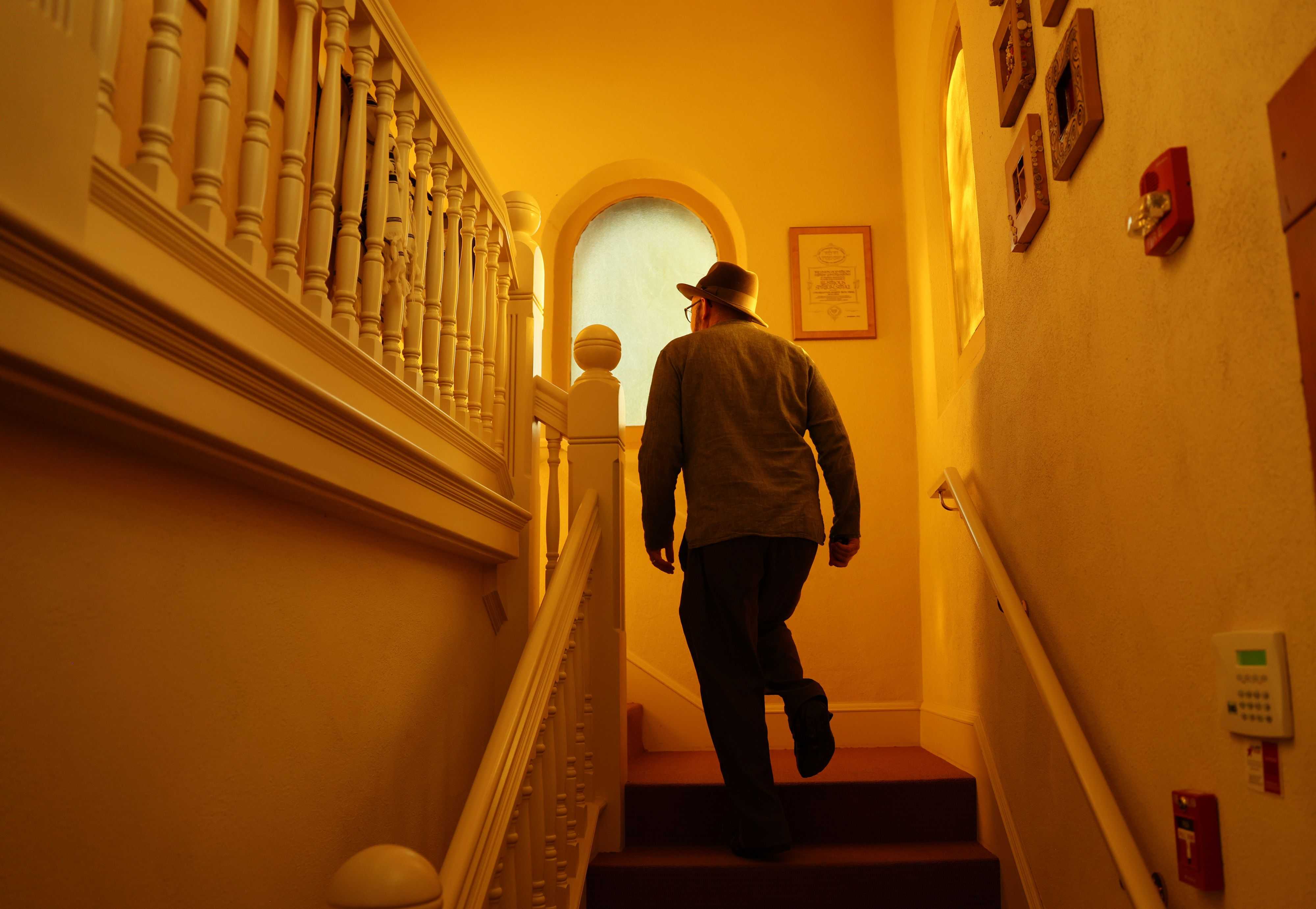 Rabbi Dan Fink, shown inside the temple, leads the Ahavath Beth Israel congregation. The synagogue is the oldest in continuous use west of the Mississippi.